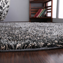 hand-tufted-shag-polyester-round-rug-solid-black-silver-closeup 3