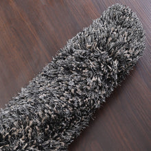hand-tufted-shag-polyester-round-rug-solid-black-silver-closeup 4