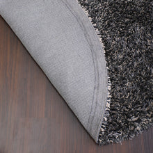 hand-tufted-shag-polyester-round-rug-solid-black-silver-closeup 5