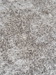 hand-tufted-shag-polyester-solid-gray-white-rectangle-rug-closeup-6