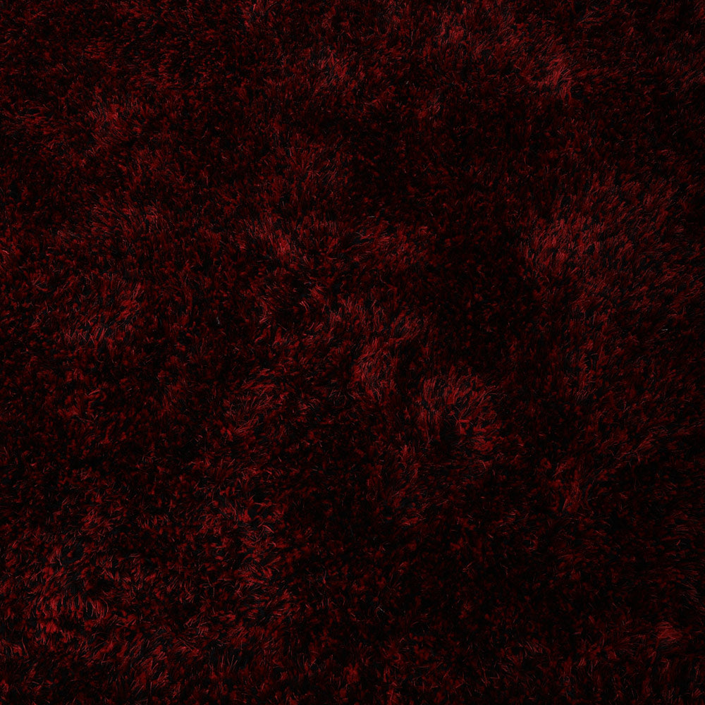 hand-tufted-shag-polyester-solid-red-black-rectangle-rug-closeup-1
