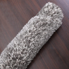 hand-tufted-shag-polyester-solid-silver-white-round-rug-closeup-4