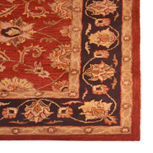 hand-tufted-wool-area-rug-oriental-red-black-closeup 2