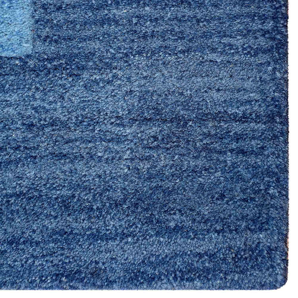 hand-tufted-wool-area-rug-contemporary-blue-closeup-1