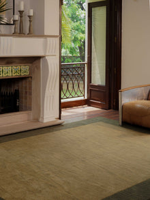 hand-knotted-wool-contemporary-green-rug-side-1