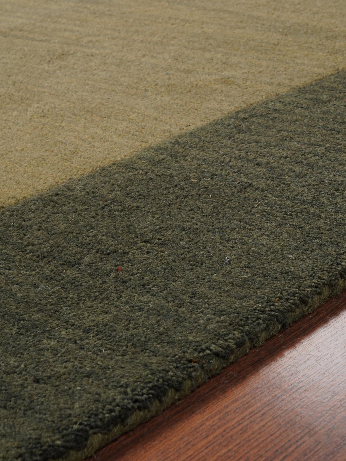 hand-knotted-wool-contemporary-green-rug-closeup-1