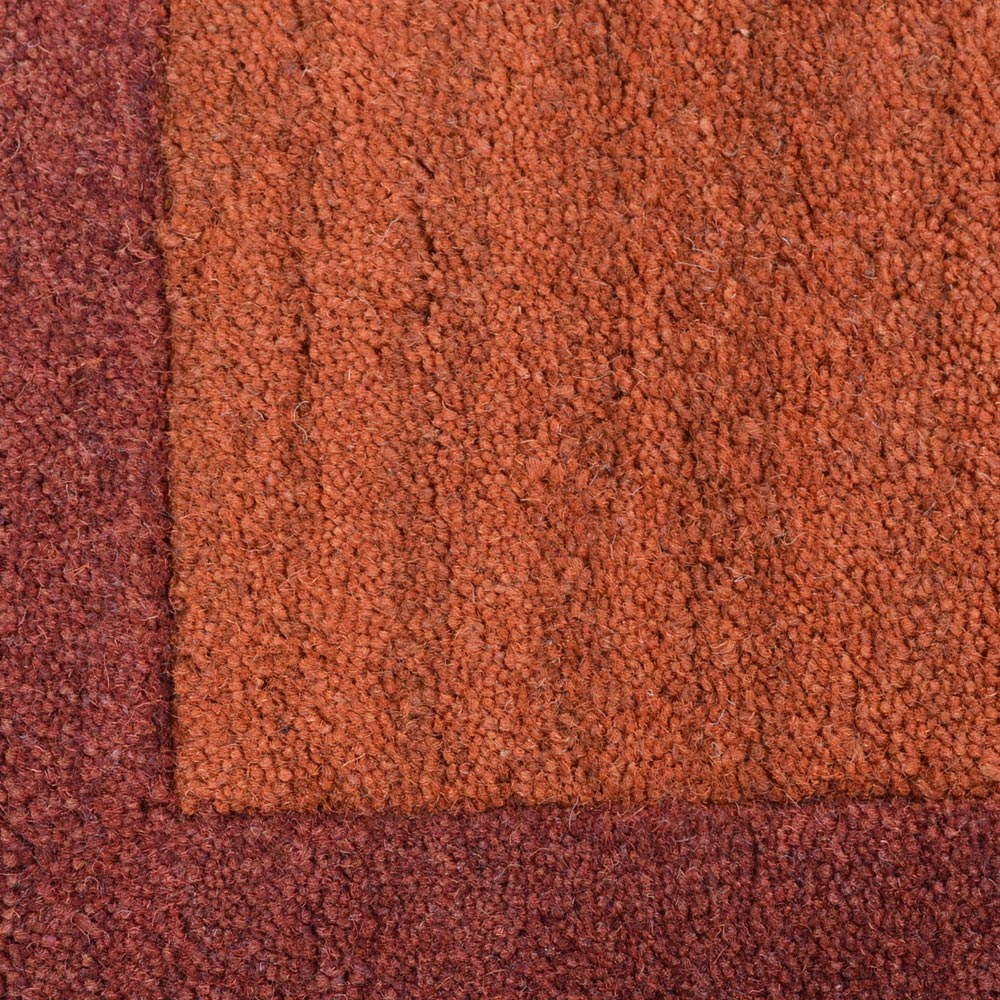 hand-tufted-contemporary-orange-red-rug-closeup-1
