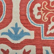 hand-tufted-wool-round-rug-floral-red-beige-closeup-1