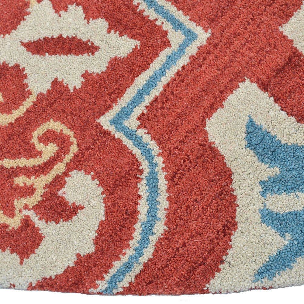 hand-tufted-wool-round-rug-floral-red-beige-closeup-2