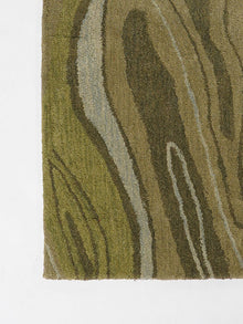 hand-tufted-wool-area-rug-abstract-green-closeup-1