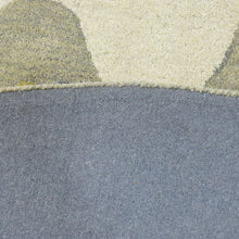 hand-knotted-wool-abstract-multicolor-round-rug-closeup-3