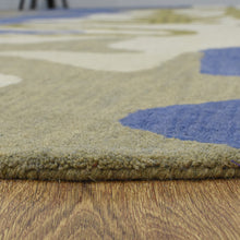 hand-knotted-wool-abstract-multicolor-round-rug-closeup-4