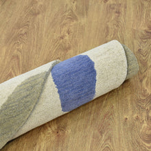 hand-knotted-wool-abstract-multicolor-round-rug-closeup-6