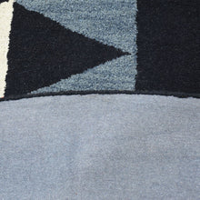 hand-knotted-wool-geometric-multicolor-round-rug-closeup-3