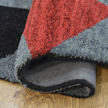 hand-knotted-wool-geometric-multicolor-round-rug-closeup-5