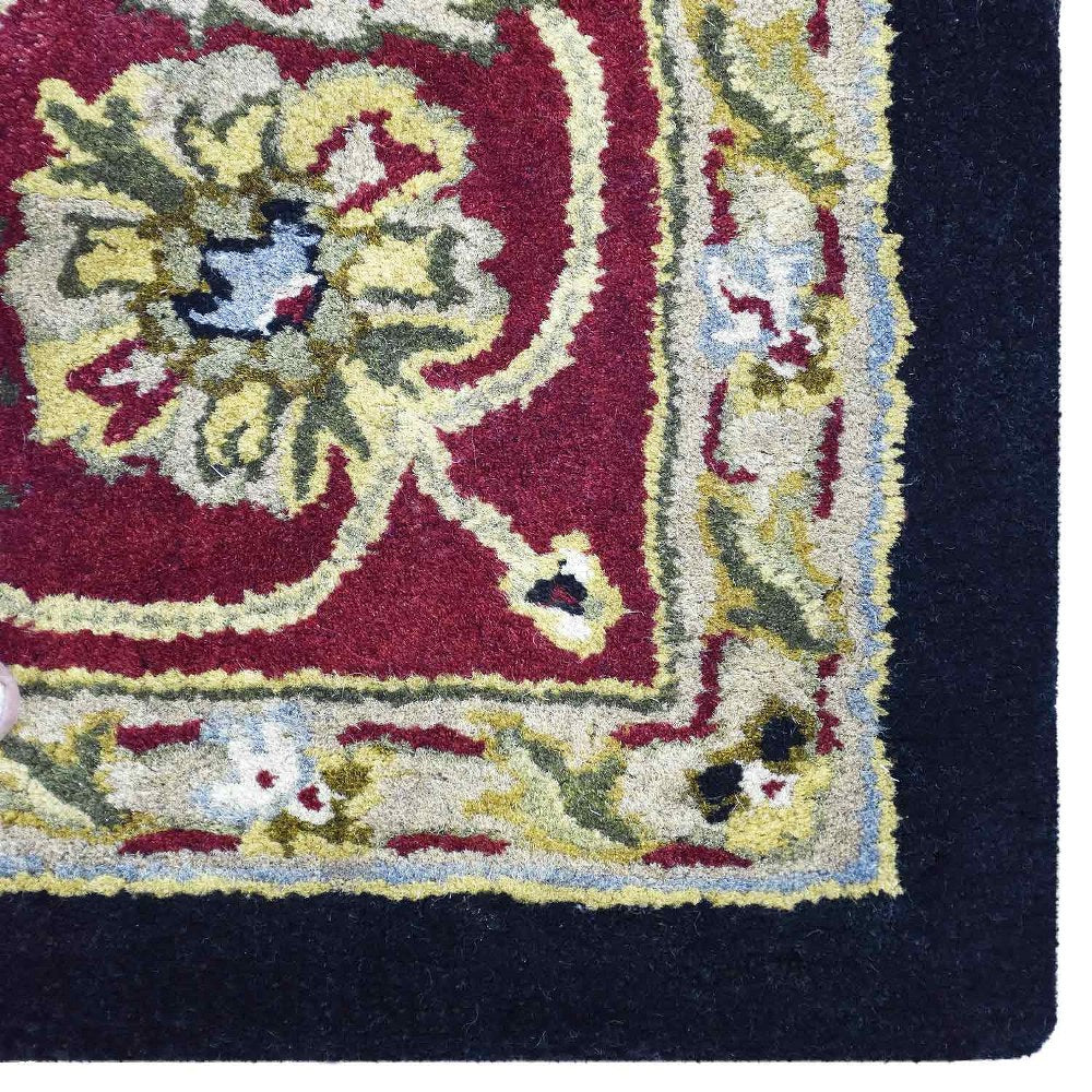hand-tufted-wool-area-rug-oriental-black-red-closeup 1