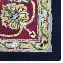 hand-tufted-wool-area-rug-oriental-black-red-closeup 1