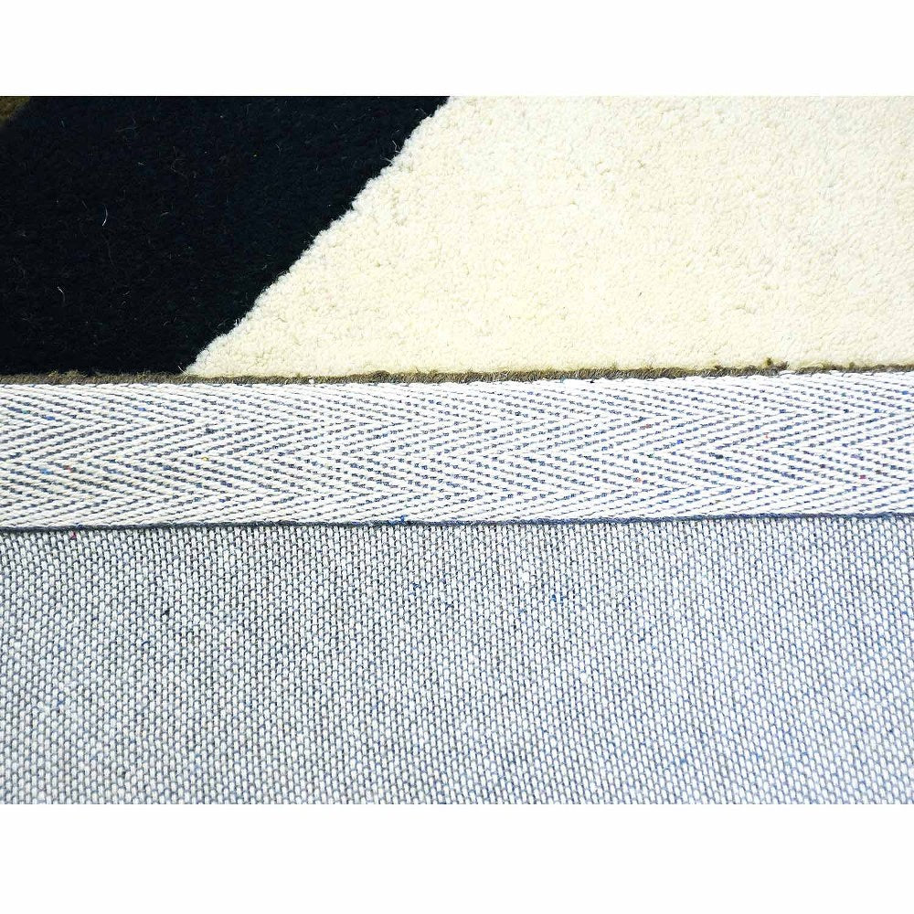 hand-tufted-wool-area-rug-contemporary-multicolor-closeup 3