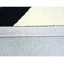 hand-tufted-wool-area-rug-contemporary-multicolor-closeup 3