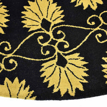 hand-tufted-wool-round-area-rug-floral-black-gold-closeup 1