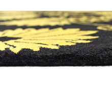 hand-tufted-wool-round-area-rug-floral-black-gold-closeup 2
