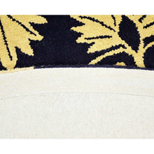 hand-tufted-wool-round-area-rug-floral-black-gold-closeup 3