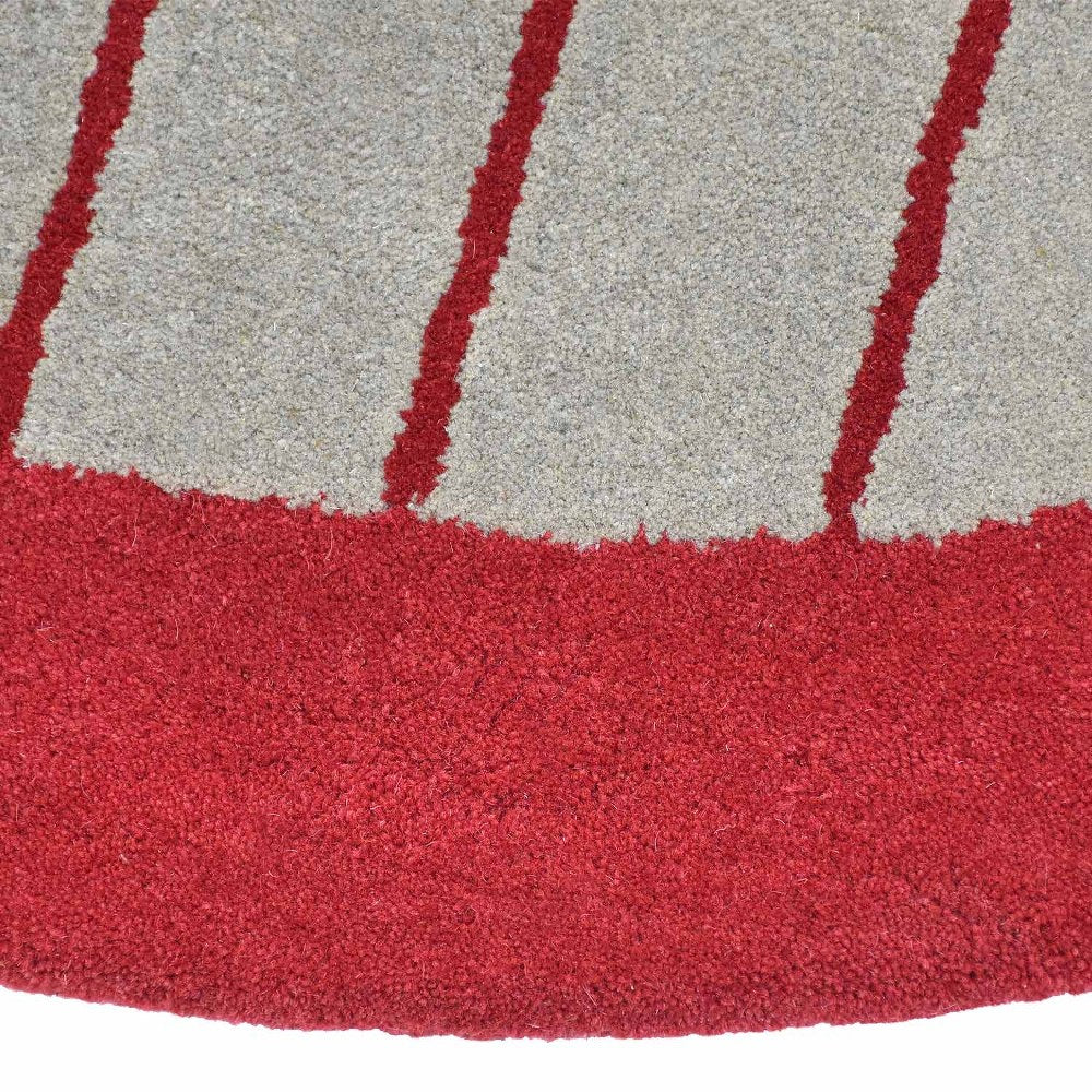 hand-tufted-wool-round-area-rug-contemporary-multicolor-closeup 1