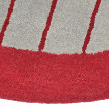 hand-tufted-wool-round-area-rug-contemporary-multicolor-closeup 1