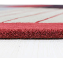 hand-tufted-wool-round-area-rug-contemporary-multicolor-closeup 2