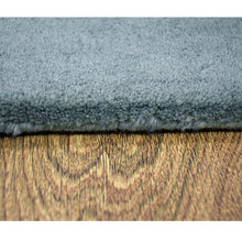 hand-tufted-wool-area-rug-contemporary-beige-gray-closeup 2