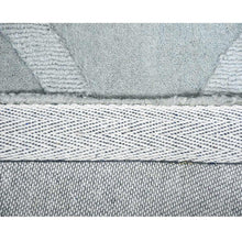 hand-tufted-wool-area-rug-contemporary-light-green-closeup 3