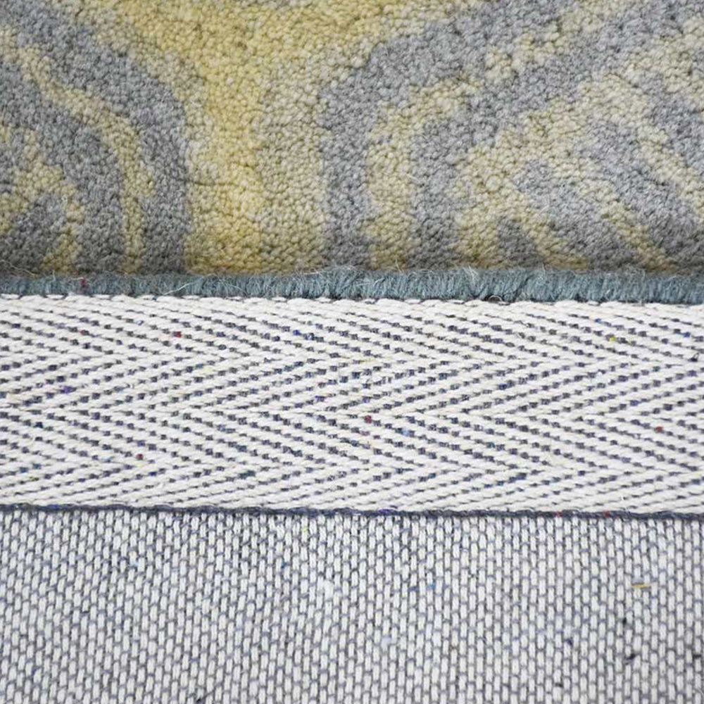 hand-tufted-wool-area-rug-contemporary-multicolor-closeup 1