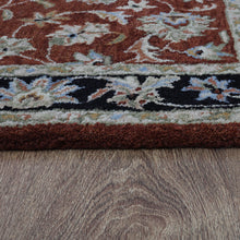 hand-tufted-wool-area-rug-oriental-red-black-closeup 1