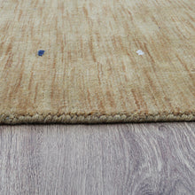 hand-knotted-loom-wool-area-rug-contemporary-gold-closeup 3