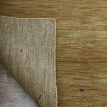 hand-knotted-loom-wool-area-rug-contemporary-gold-closeup 5