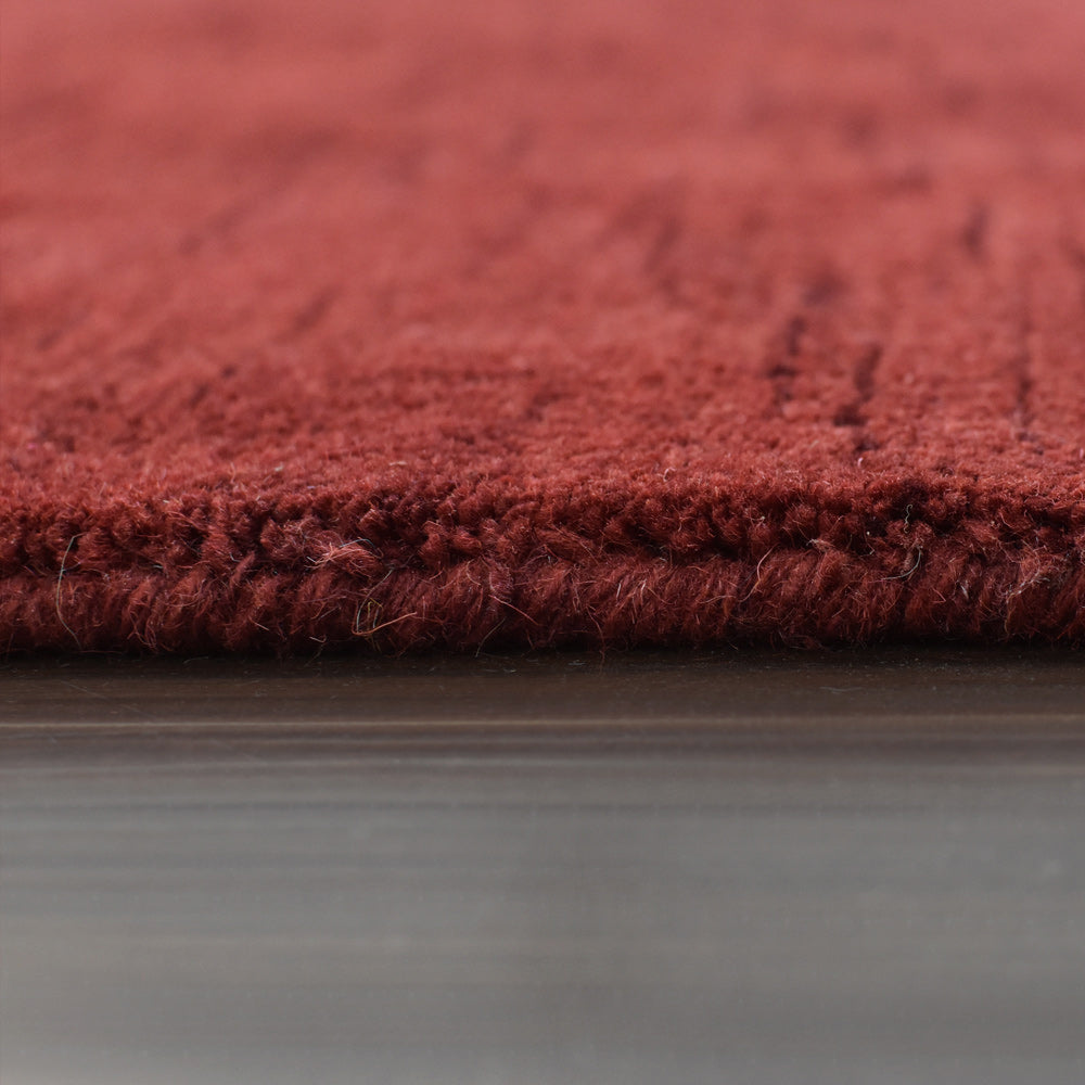 hand-knotted-loom-wool-solid-red-octagon-rug-closeup-4