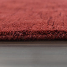 hand-knotted-loom-wool-solid-red-octagon-rug-closeup-4