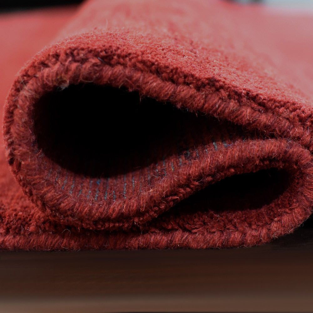 hand-knotted-loom-wool-solid-red-octagon-rug-closeup-5