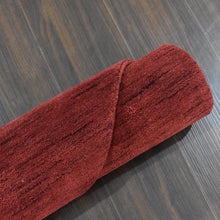 hand-knotted-loom-wool-solid-red-octagon-rug-closeup-6