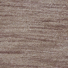 hand-knotted-loom-wool-solid-light-brown-round-rug-closeup-1