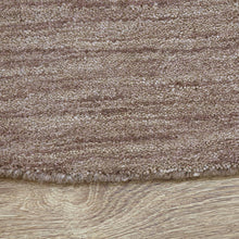 hand-knotted-loom-wool-solid-light-brown-round-rug-closeup-2