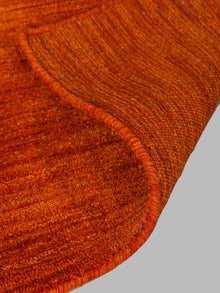hand-knotted-loom-wool-solid-light-red-rug-closeup-4
