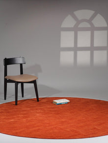hand-knotted-loom-wool-solid-light-red-round-rug-side-1