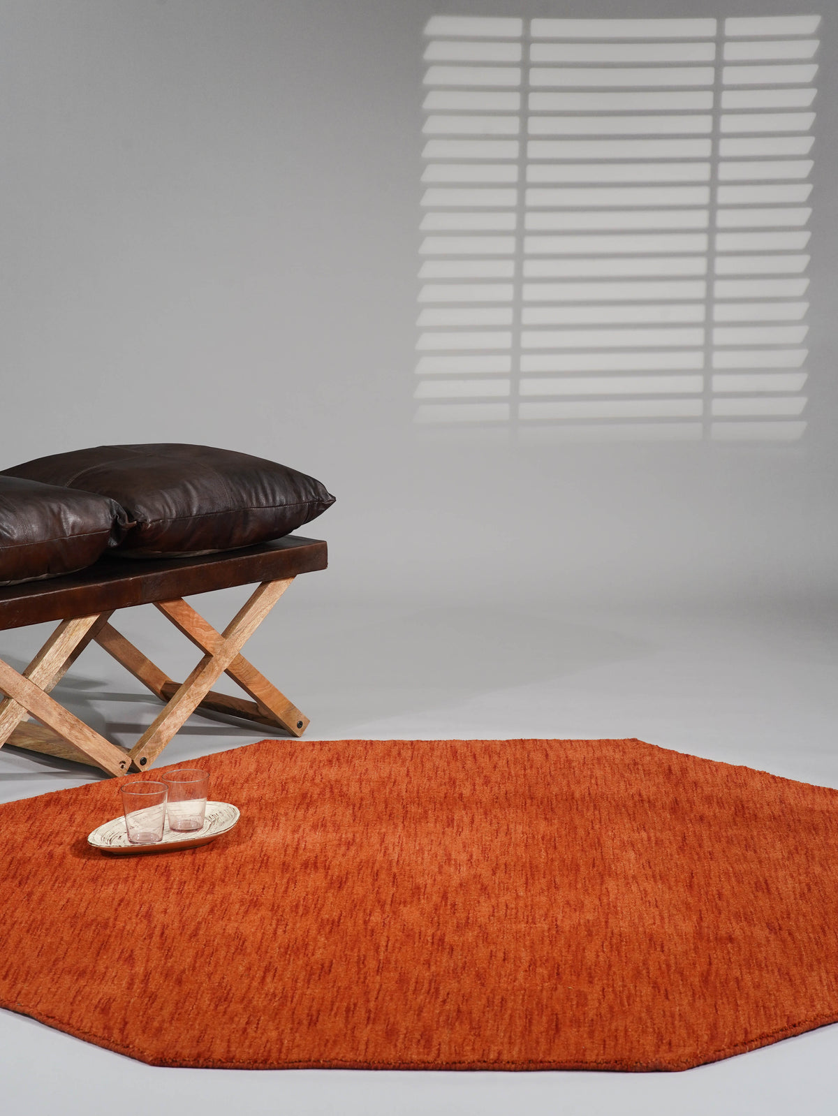 hand-knotted-loom-wool-solid-light-red-octagon-rug-side-1