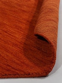hand-knotted-loom-wool-solid-light-red-octagon-rug-closeup-6