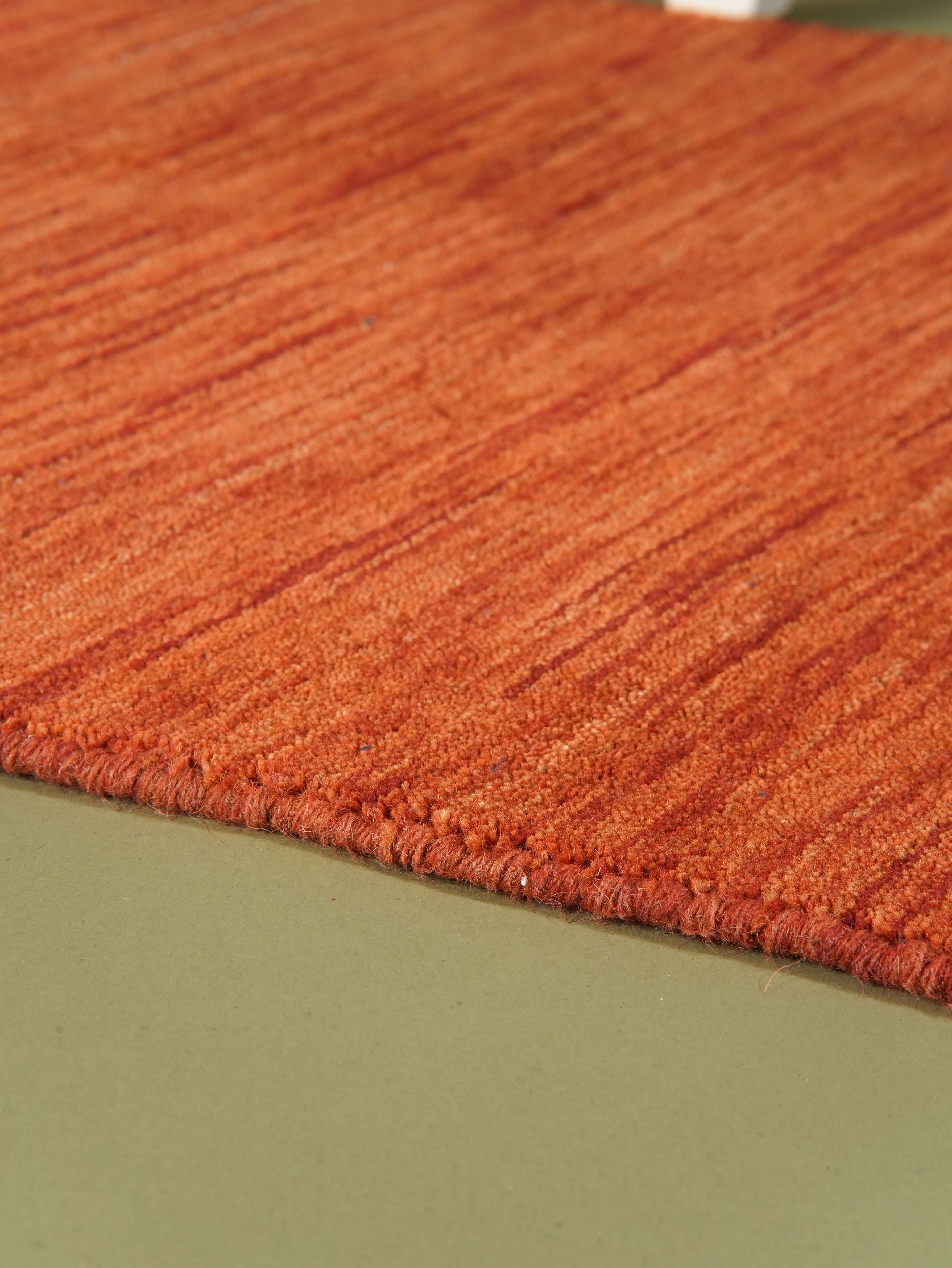 hand-knotted-loom-wool-solid-light-red-runner-rug-closeup-1