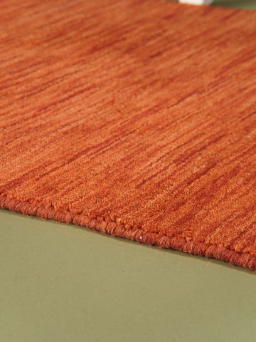 hand-knotted-loom-wool-solid-light-red-runner-rug-closeup-1