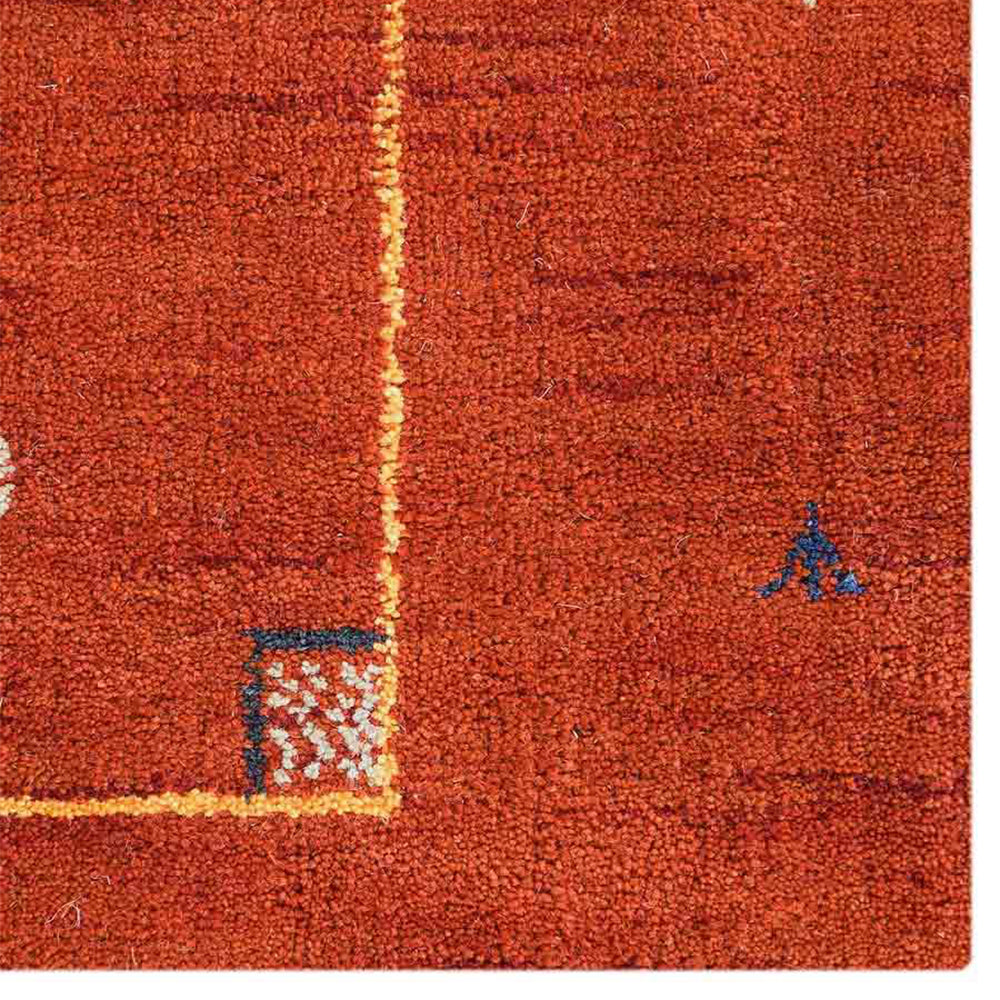 hand-knotted-loom-wool-area-rug-contemporary-rust-closeup 1