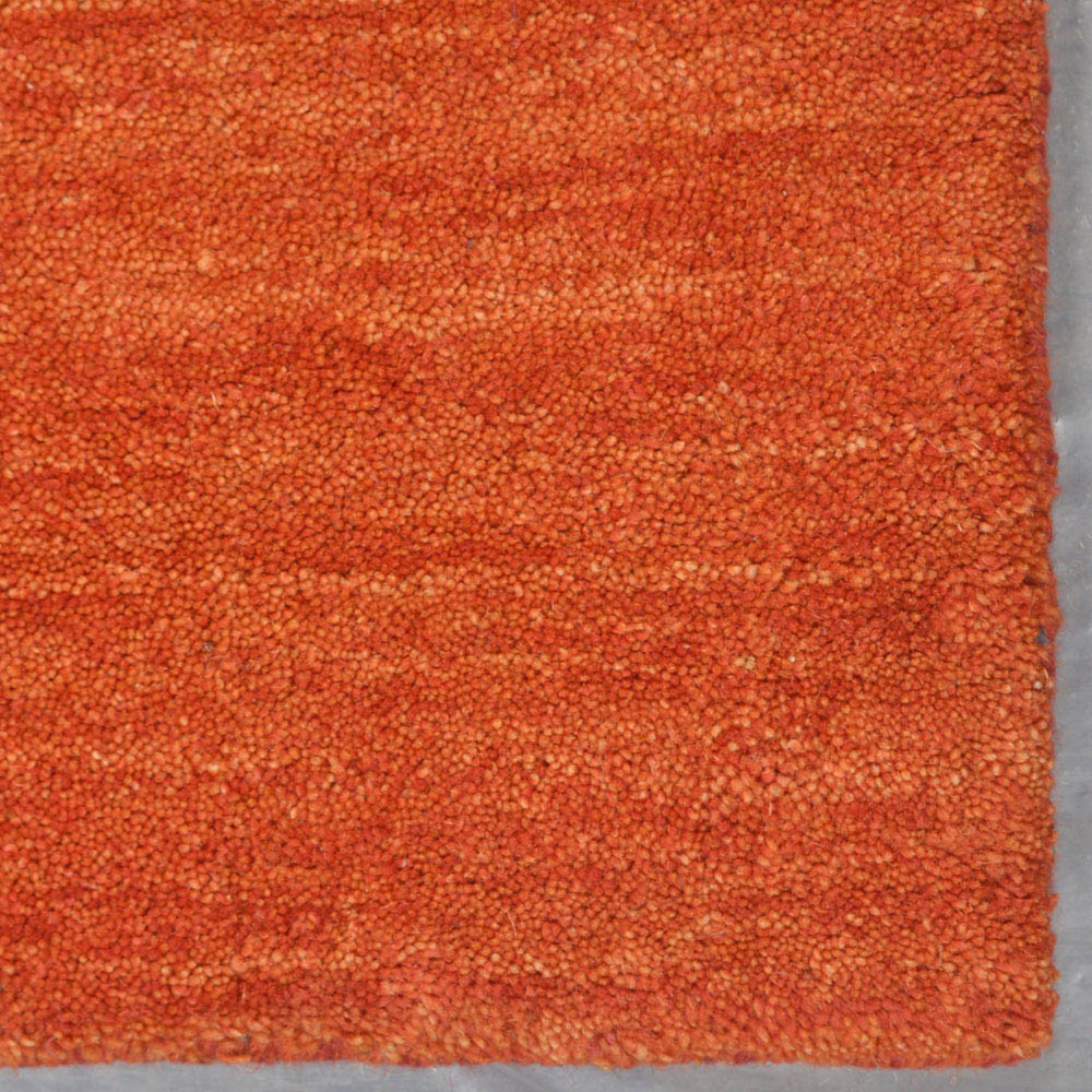hand-knotted-loom-wool-area-rug-contemporary-rust-closeup 2