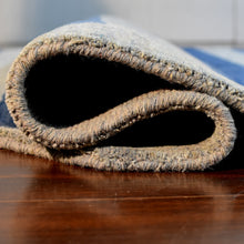 hand-knotted-wool-contemporary-light-blue-octagon-rug-closeup-5